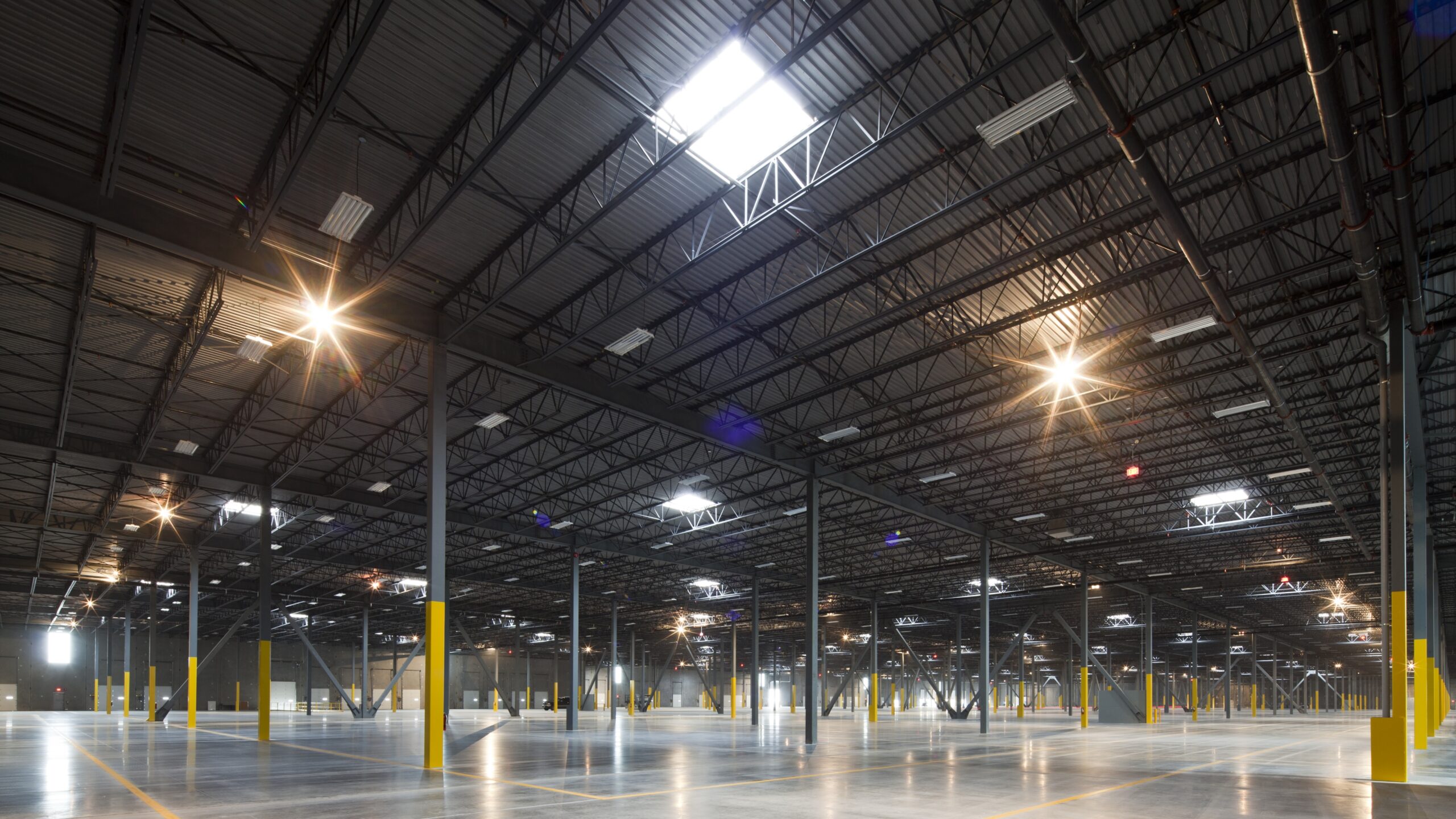 Large warehouse bright skylights hero