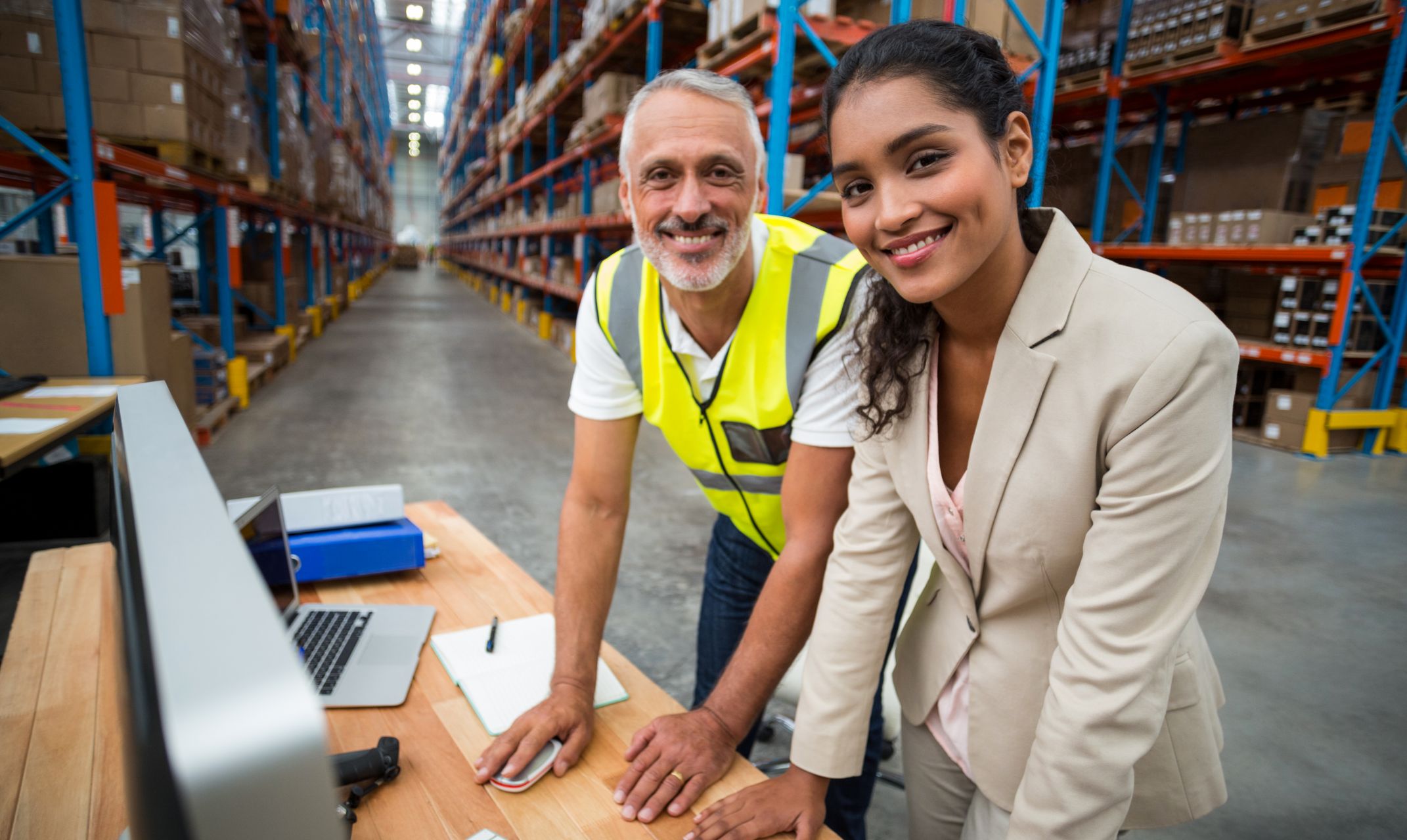 Admin And Worker In Warehouse