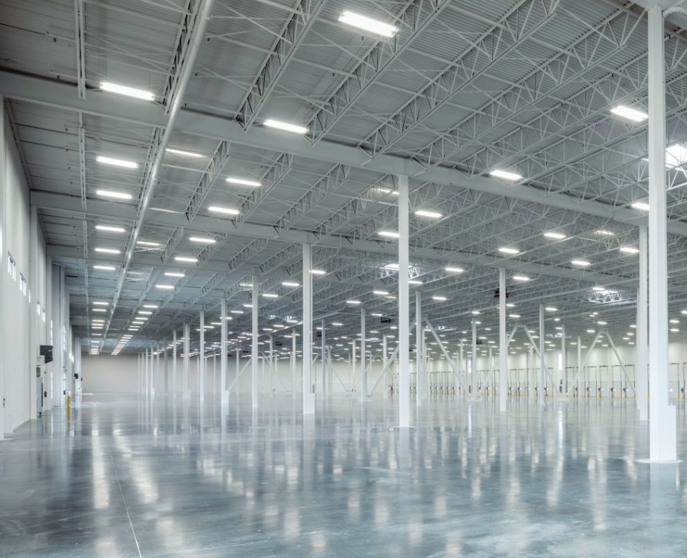 Sustainability 15 Skylights In Empty Warehouse Feature
